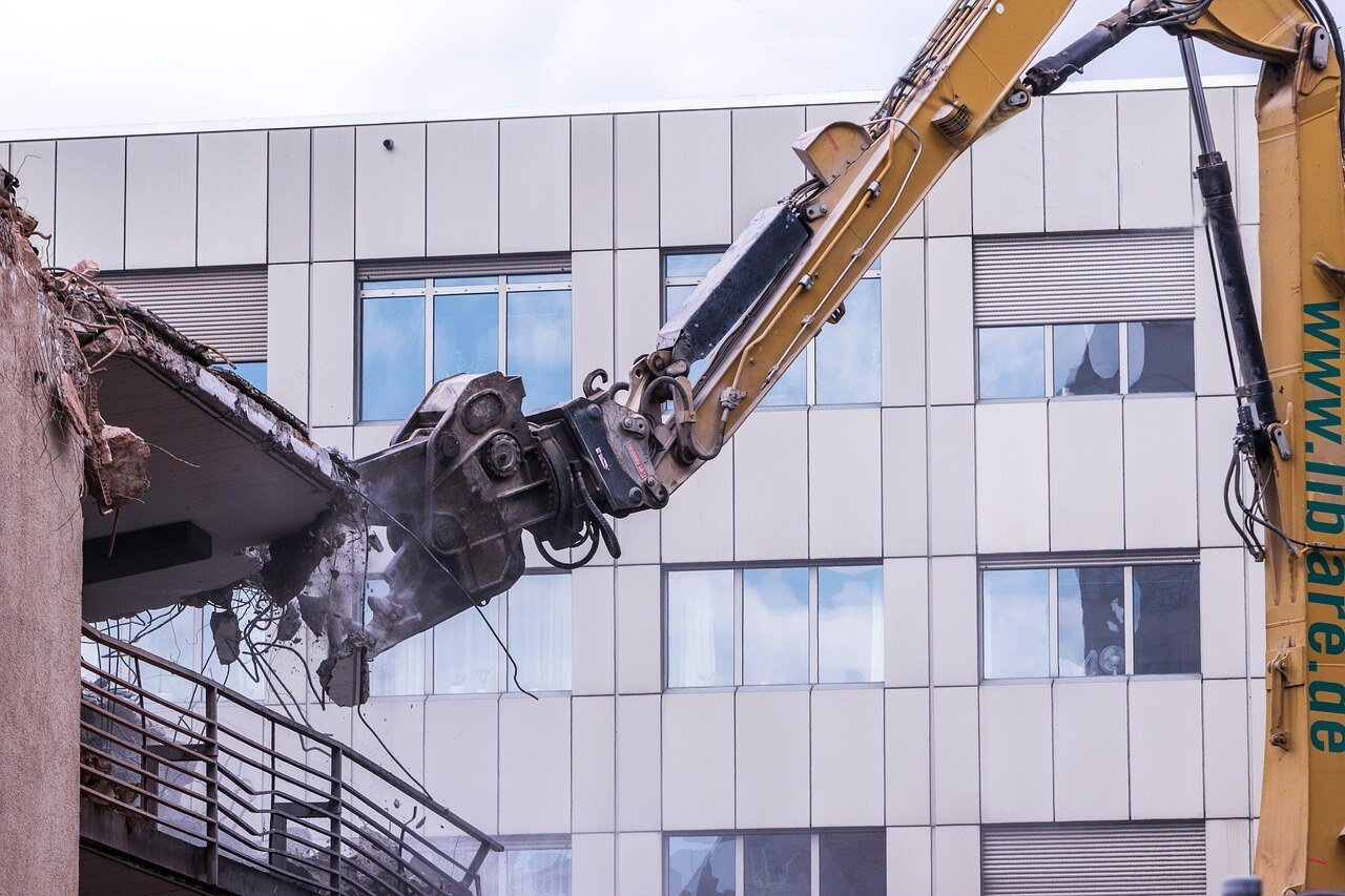 A demolition occurring within a few feet of a existing office